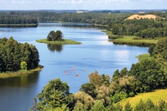 Masuria (Mazury) - famous lake district in Poland. Summer landscape in Europe. Jedzelewo lake in Stare Juchy.